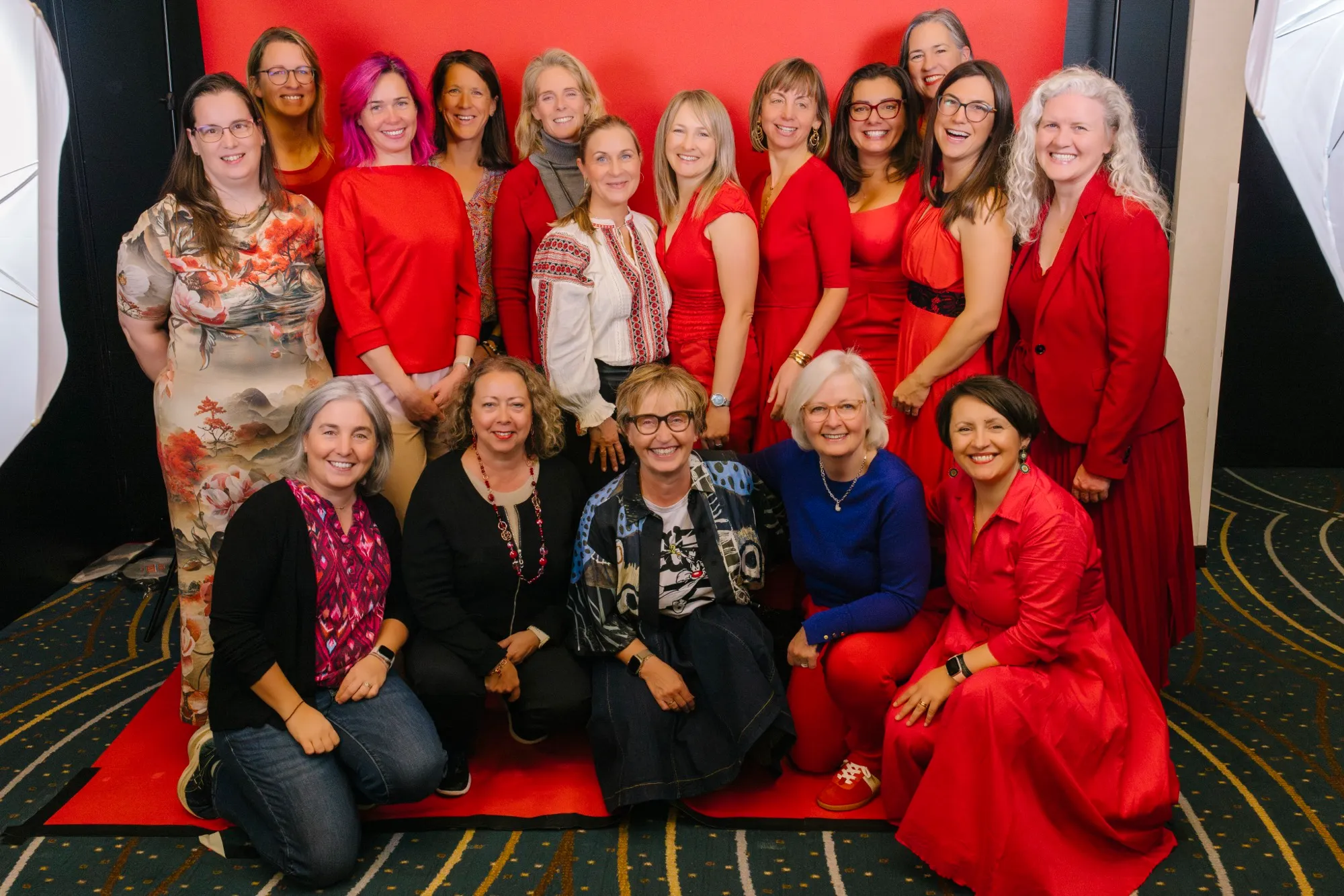 A small group of clients in red at SIGRUN Live 2025