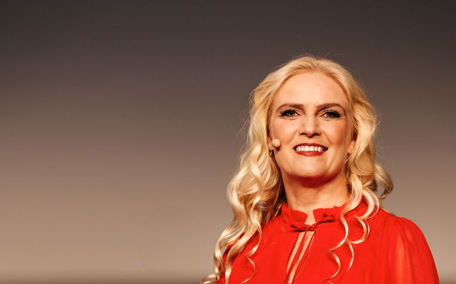 Sigrun smiling on stage