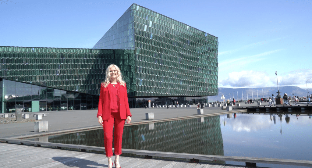 Sigrun in front of Harpa, the concert hall in Reykjavik, Iceland